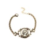 Bracciale di bigiotteria con moneta in argento