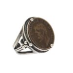 Anello artigianale in argento con moneta