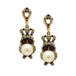 Orecchini a forma di gufo con perla